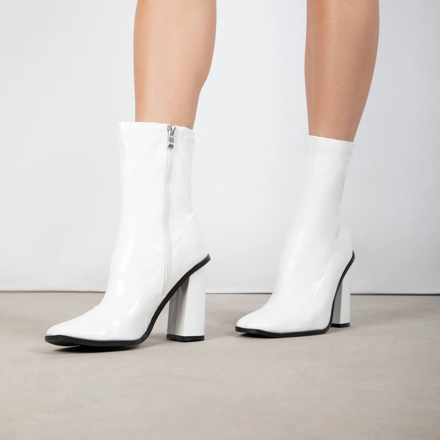 RAID Saylor Block Heeled Ankle Boot in White